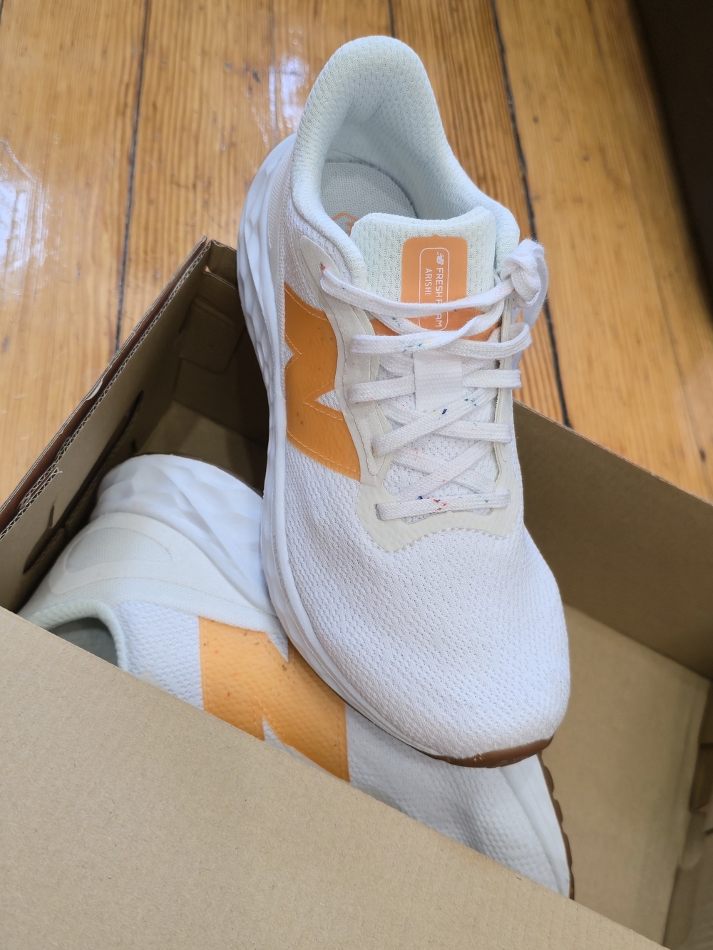 New Balance White Athletic Sneakers with Orange Accent